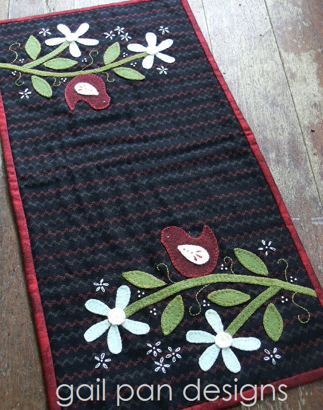 In The Daisy Patch Table Runner pattern by Gail Pan