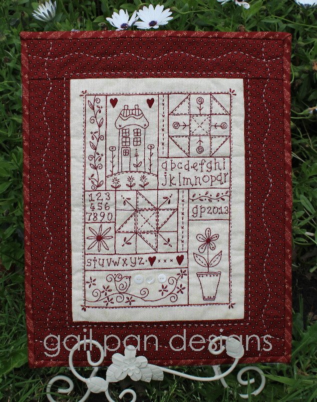 Sampler in Red stitchery pattern